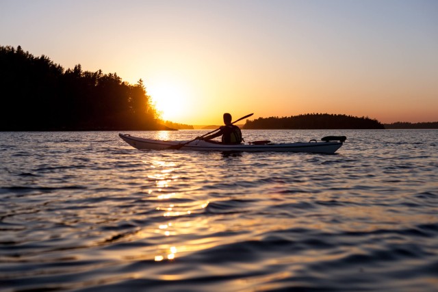 Visit Vaxholm Stockholm Archipelago Sunset Kayaking Tour and Fika in Vaxholm