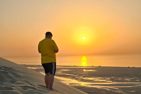 Sunrise or Sunset desert Safari with Sandboarding in Qatar