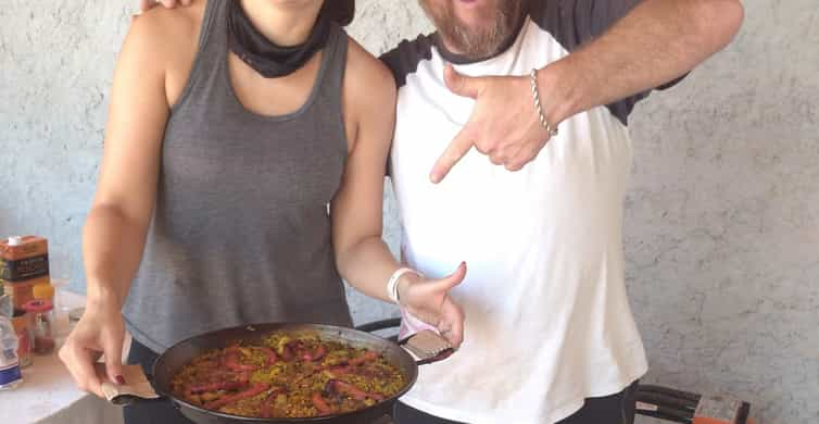 From Sitges: Paella Masterclass with Drink and Bike Ride