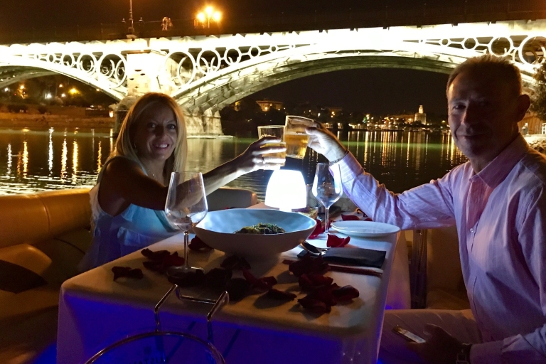 Sevilla: Private Flusskreuzfahrt mit Abendessen und Getränken