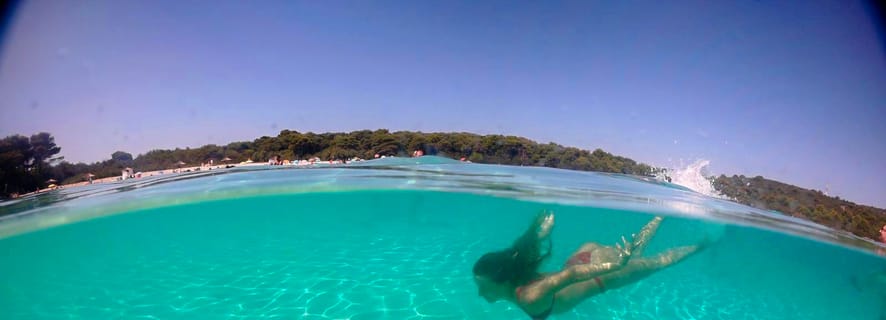 Z Zadaru: całodniowa wycieczka łodzią na plażę Sakarun z lunchem