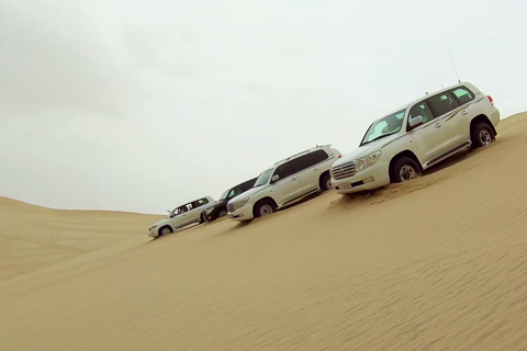 Doha: Safári no deserto com quadriciclo, sandboard e manobras radicais nas dunastour privado