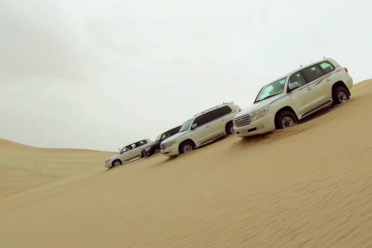 Doha: Safari nel deserto con ATV, Sandboarding e corsa sulle dune in 4x4Tour privato