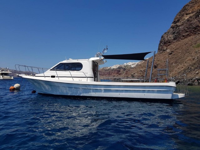 Visit Santorini Private Motorboat Cruise and Volcano Hike in Santorini, Greece
