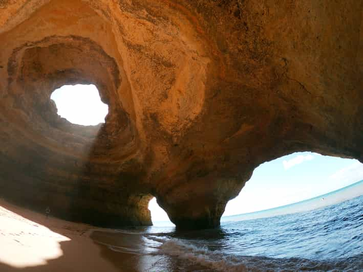 Benagil: Benagil Cave Stand Up PaddleBoard Tour at Sunrise | GetYourGuide