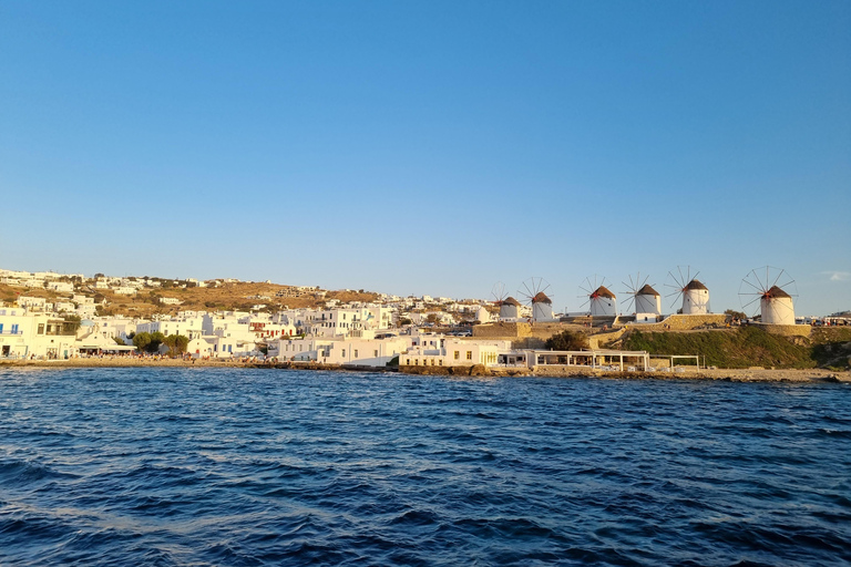 Mykonos : Croisière privée au coucher du soleil dans la mer Égée avec plateaux mykoniensMYKONOS PRIVE CROISIÈRE AU COUCHER DU SOLEIL AVEC TRANSFERT