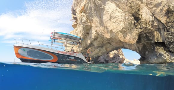 Ibiza: Full Day paddle Boat Tour with Course & BBQ included.