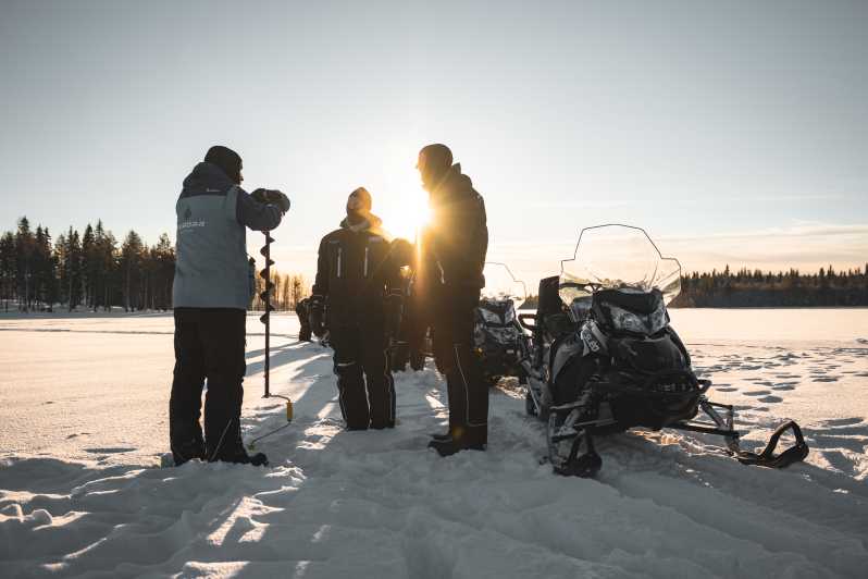 Rovaniemi: Tour de safari de motos de nieve eléctricos con pesca en hielo