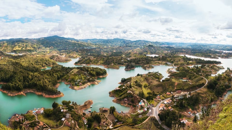 From Medellin: Guatape Lake Boat Tour and El Peñol Rock Hike | GetYourGuide