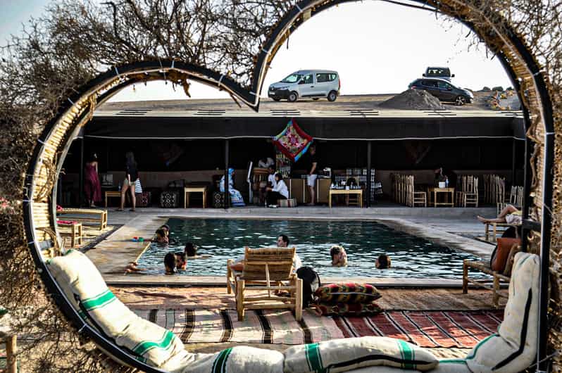 Agafay Desert Camel Ride, Dinner, and Fire Show GetYourGuide