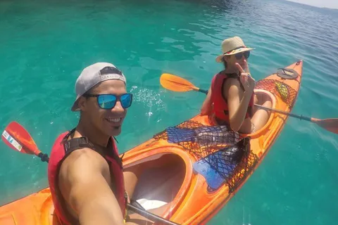 Lefkada: Hidden Blue Cave Kayak Trip with Lunch & Fruits