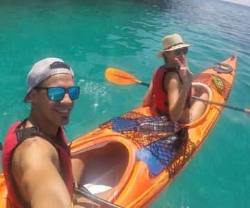 Lefkada: Hidden Blue Cave Kayak Trip with Lunch & Fruits