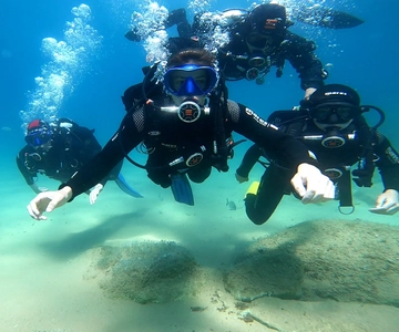 From Barcelona: Tossa de Mar Scuba Diving and 3-Course Meal