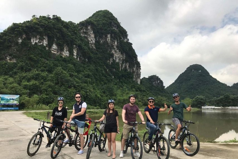 From Hanoi: Bai Dinh and Tràng An Guided Day Trip with Lunch Bai Dinh - Trang An Full Day - Cave, Boat, Bus, Lunch, Guide