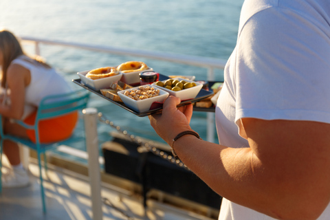 Lisboa: tour al atardecer por el río Tajo con aperitivos y bebidas