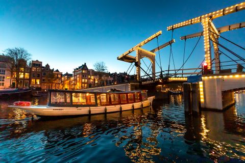 Амстердам: вечерний круиз класса люкс по каналам с гидом