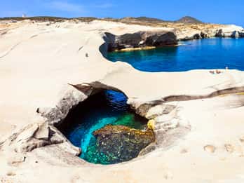 From Sifnos: Kimolos and North Milos Speedboat Tour