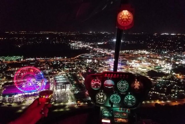 Visit Orlando Theme Parks at Night Helicopter Flight in Kissimmee, Florida, USA
