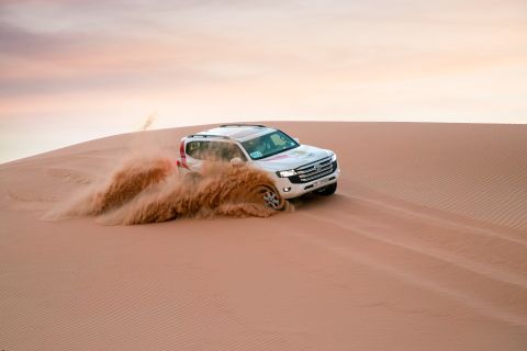 Abu Dhabi: Safari nel deserto con barbecue, danza del ventre e Tannura