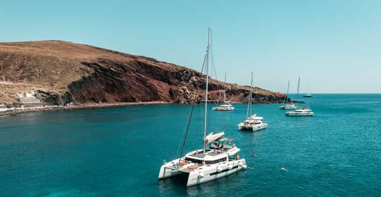 Santorini: Majestic Catamaran Cruise with Meal and Drinks | GetYourGuide