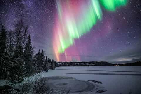 Ice Floating in Lapland With Northern Lights