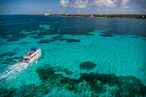 De Cancún: excursion d'une journée en plongée avec tuba et en bateau sur la plage à Isla Mujeres