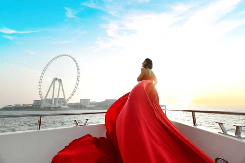 Private Dubai Marina Yacht Flying Dress Photo Shooting | GetYourGuide
