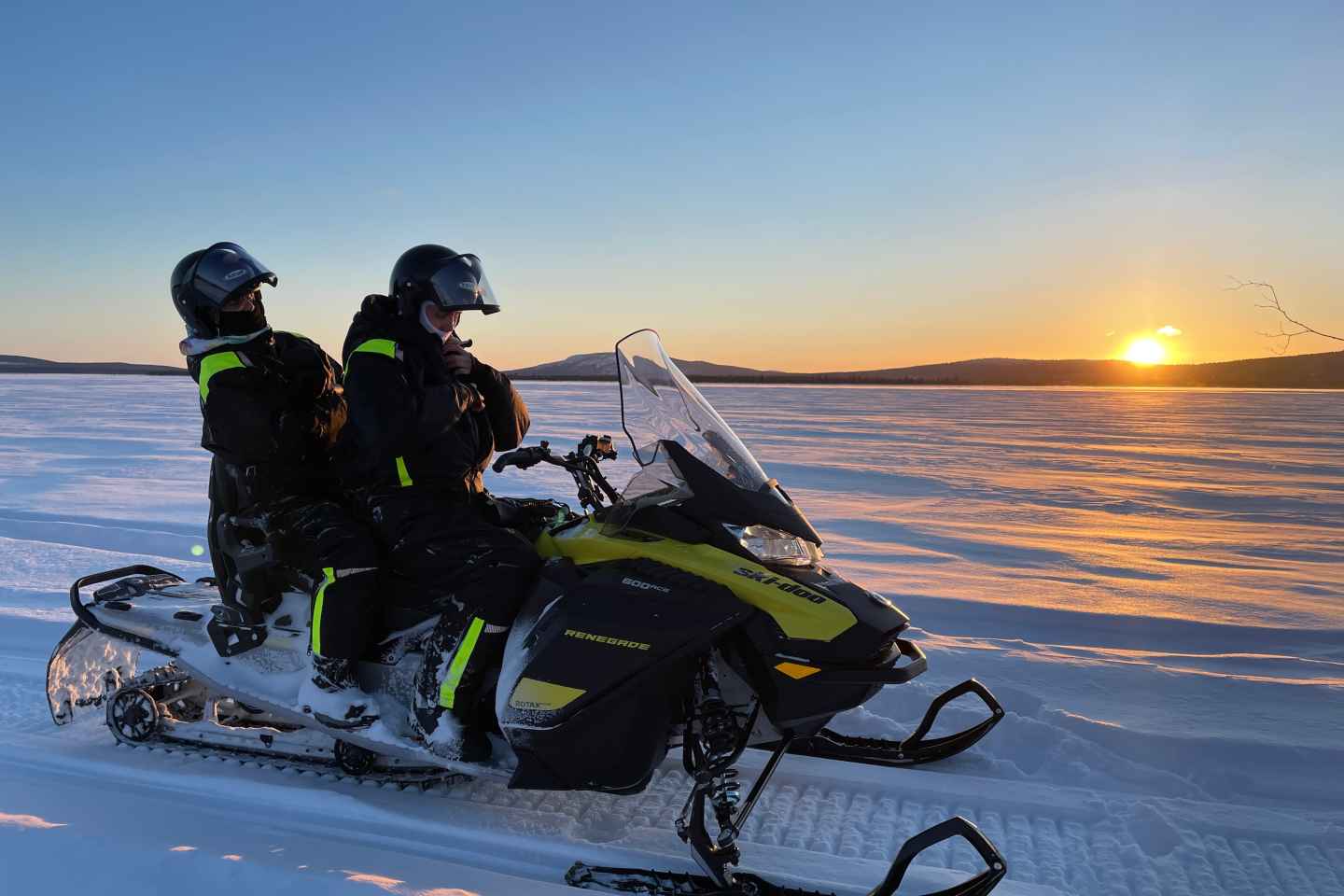 Kiruna: Guided Snowmobile Tour and Swedish Fika Experience