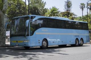 Von Palermo: Bustransfer zum/vom Stadtzentrum von Trapani