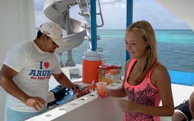 Noord: Dolphin Sunset Adventure Catamaran Cruise