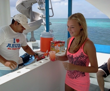 Noord: Dolphin Sunset Adventure Catamaran Cruise