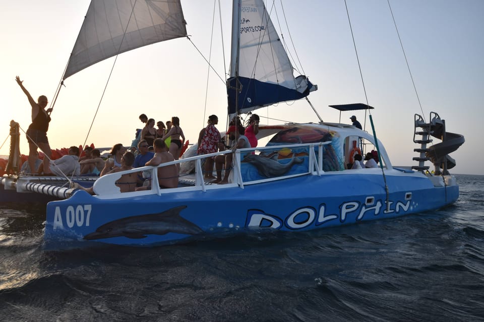 Noord Dolfijn Zonsondergang Avontuur Catamaran Cruise Getyourguide