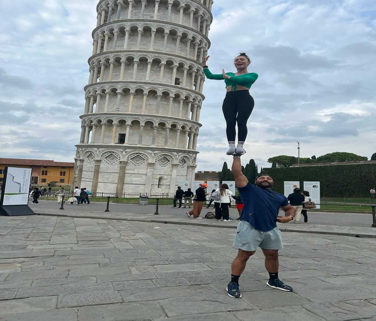 Phil's hugging a great big tower! - Picture of Pisa, Province