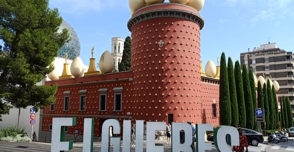 The Dalí Theatre-Museum in Figueres with its red tower and golden eggs