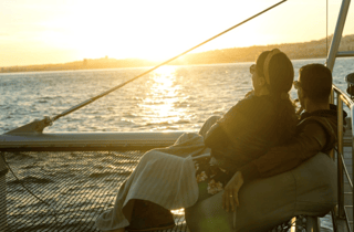 Lissabon: Sonnenuntergangs-Tour mit Musik und Getränk