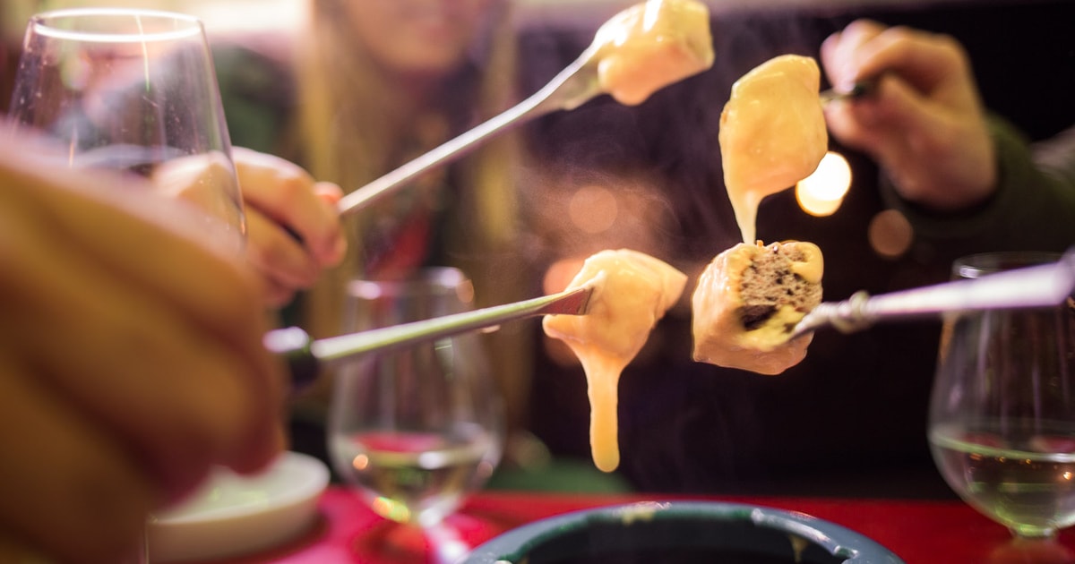 Genève rondleiding met fondue en wijn in TukTuk GetYourGuide