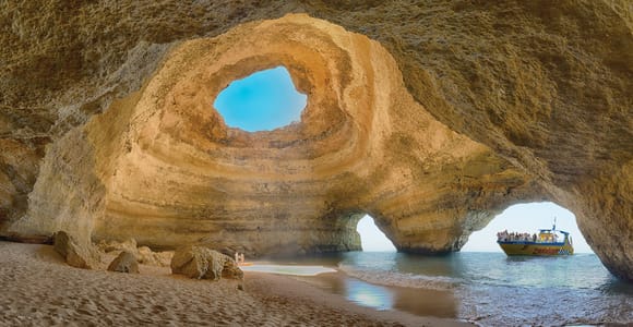 Best Benagil Cave Boat Tours (2026): Ranked, Prices & How to Book Catamaran off the Albufeira coast on a Benagil caves and dolphin watching trip