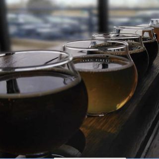 Denver: Local Breweries and Dispensary Guided Tour by Coach