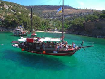 Thassos: Full-Day Cruise with BBQ, Wine, and Swim Stops
