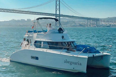 Lisbon: 6H Private Catamaran Tour with Swimming