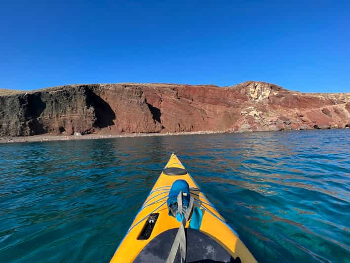 Santorini: Sea Caves Kayak Trip With Snorkeling And Picnic | GetYourGuide