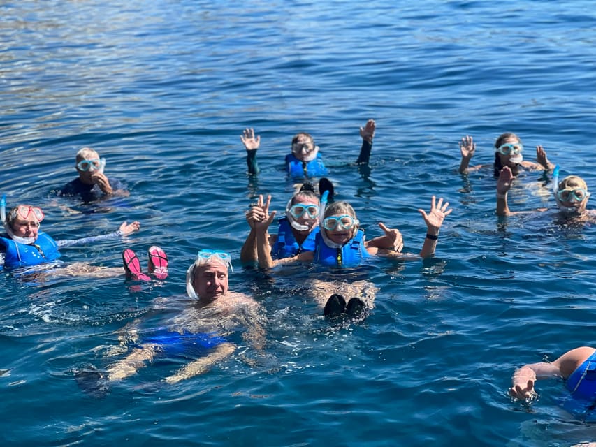 Santorini: Sea Caves Kayak Trip With Snorkeling And Picnic | GetYourGuide