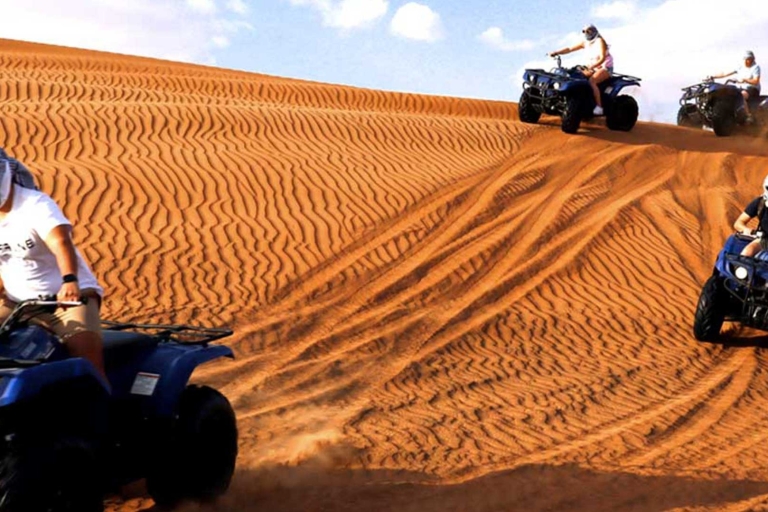 Depuis Dubaï : matinée safari dans le désert en quadTransfert privé, 1 heure de quad avec dîner BBQ VIP