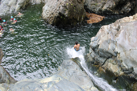 From San Juan: El Yunque Waterslide with Transportation