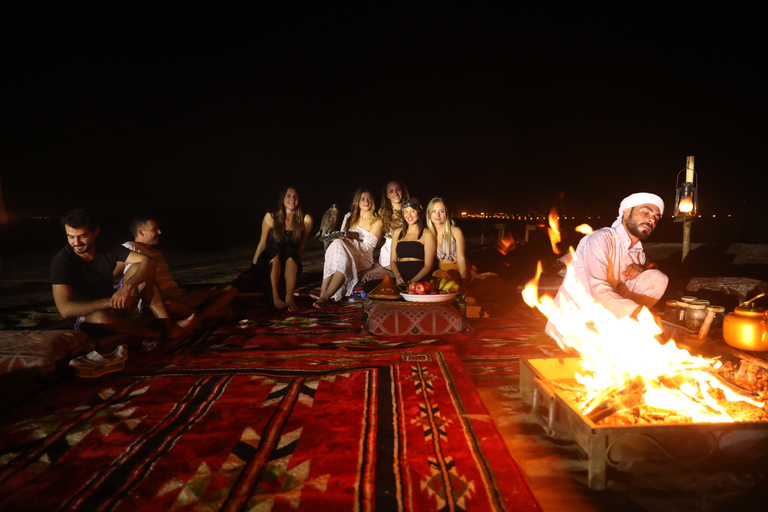 From Dubai: Red Dunes and Camel Safari with Overnight Camp Shared Tour with Private Tent