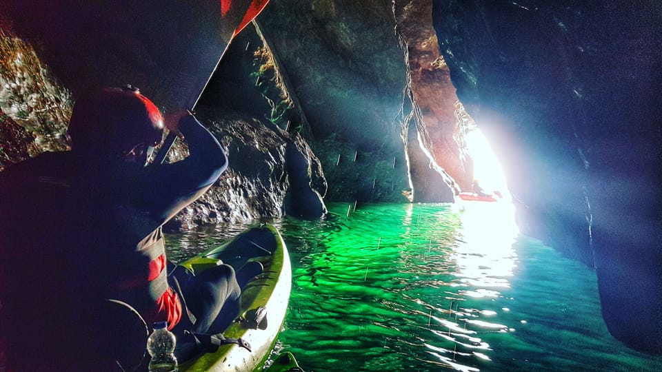 The Hook Peninsula Sea Cave Kayaking Experience with Gear GetYourGuide