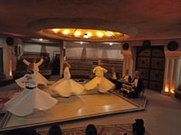 Goreme, Whirling Dervishes Show in Historical Trade Mansion - Housity