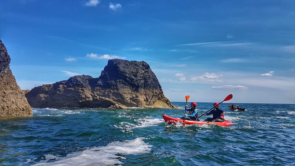 The Hook Peninsula Sea Cave Kayaking Experience with Gear GetYourGuide