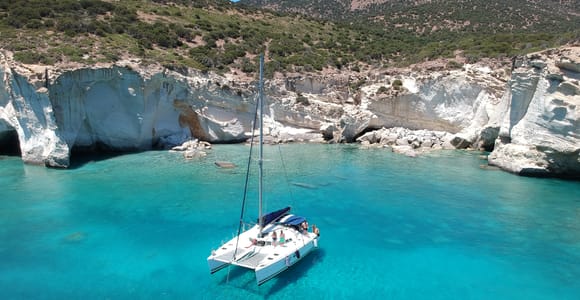 Milos: Full-Day Catamaran Cruise with Paddle Board