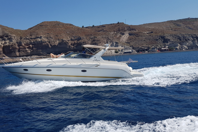 Fira: Private Sunset Cruise with BBQ, Drinks, & Hot Springs